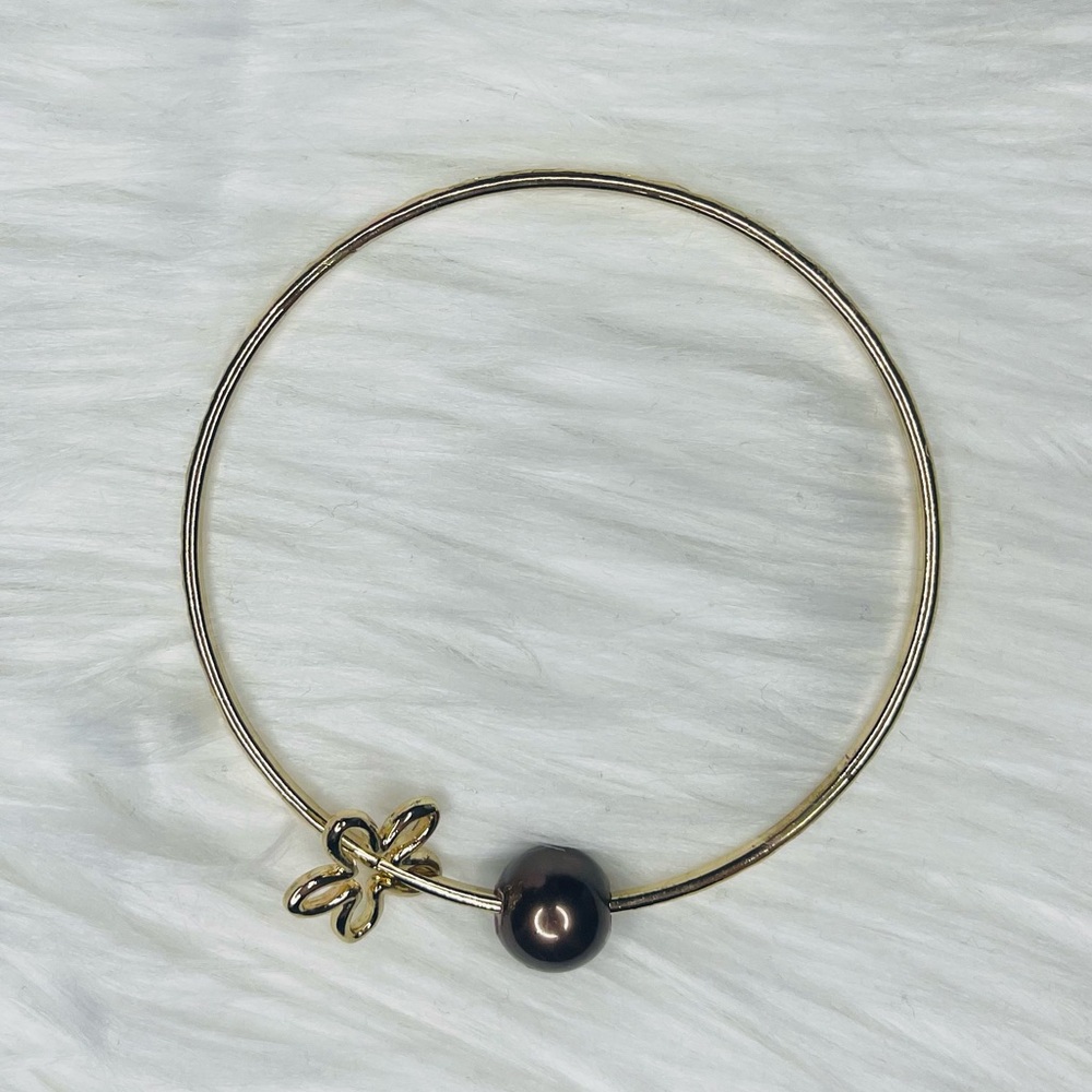 Gold bangle Bracelet with brown pearl and flower charm size 9